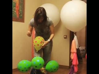 the girl bursts balloons after the holiday
